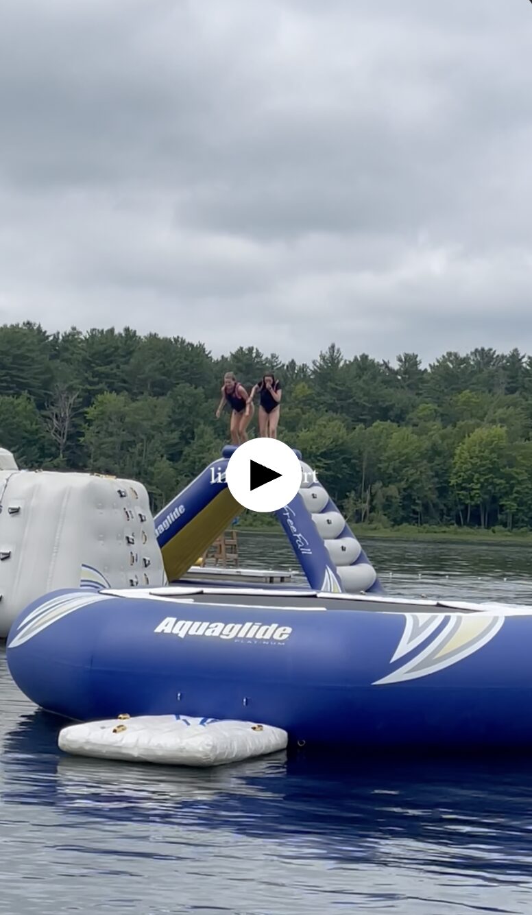 Camp Connect USA - Children on outdoor water adventure park.